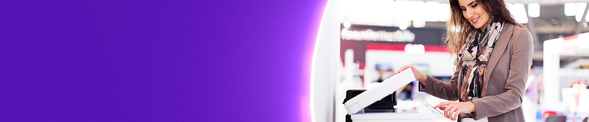 Teacher using printer in school