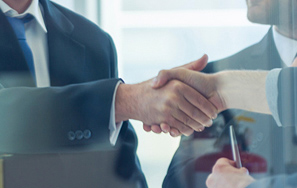 Man and women shaking hands