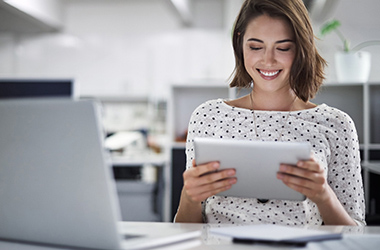 Women using her warranty replaced tablet