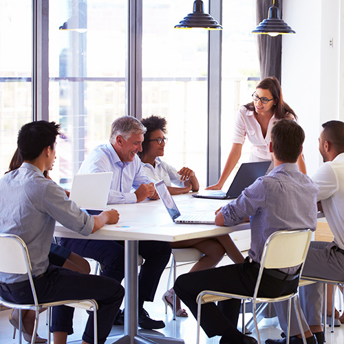 Corporate staff in strategy meeting