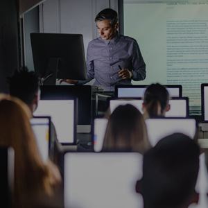 Teacher giving presentaion to students