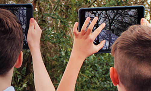 Male customer using IT equipment recently bought from BT