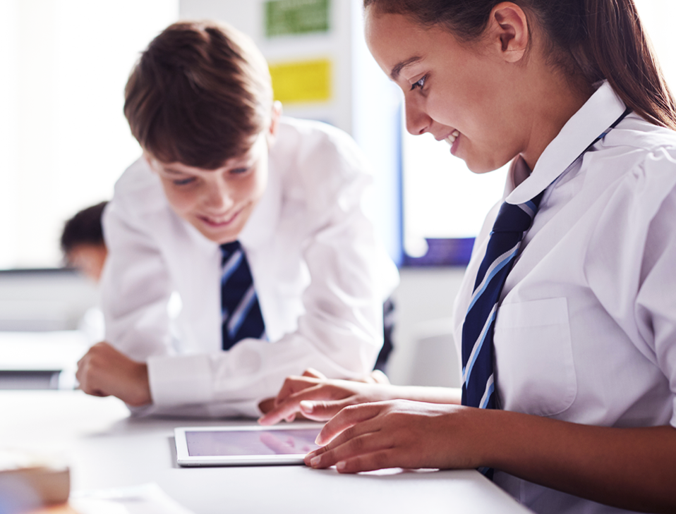 High school pupils with tablet device