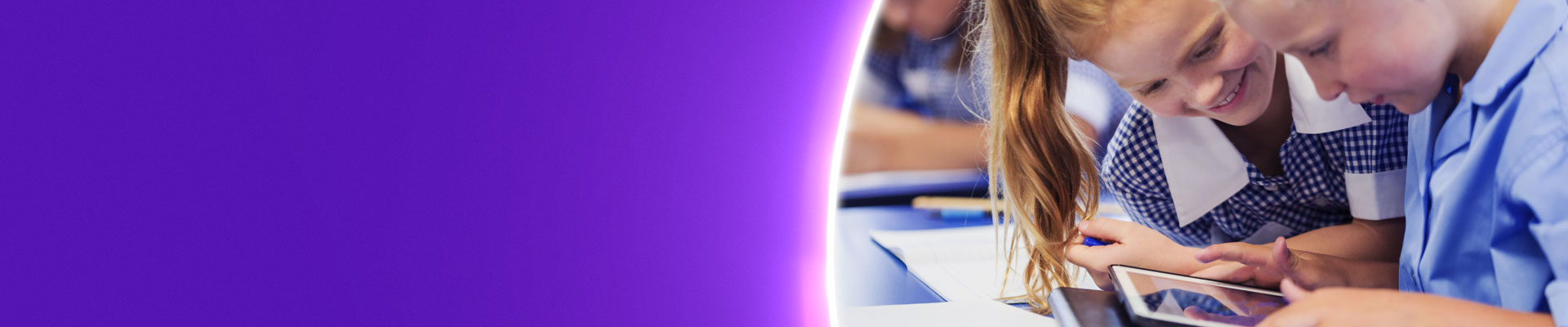 School children using an iPad