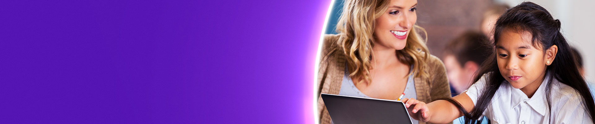 teacher supporting student using windows 10 device